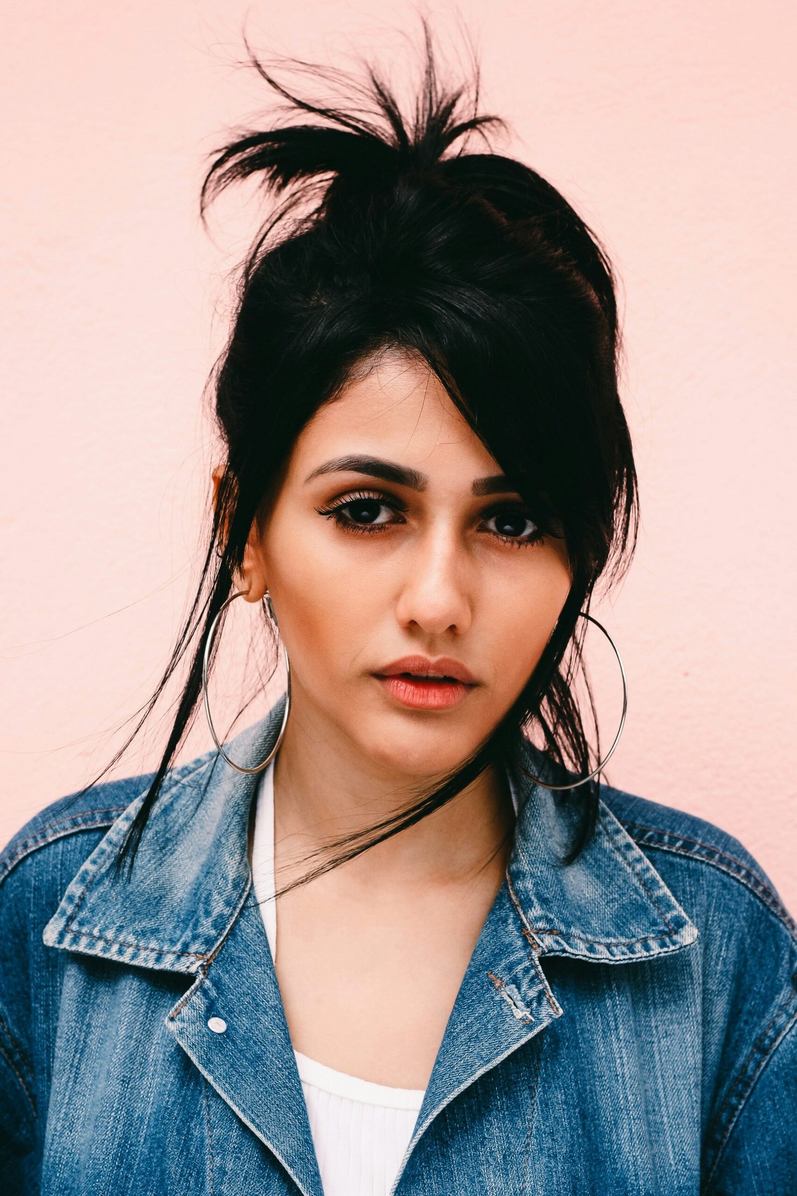 woman wearing blue denim jacket